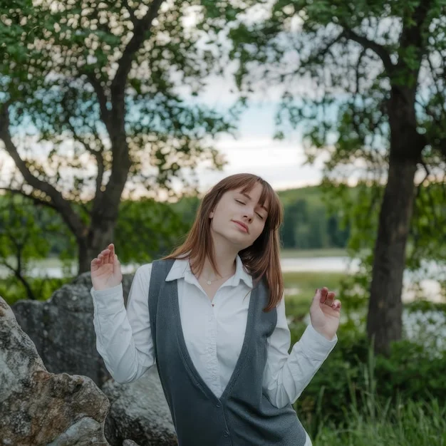 A woman enjoying nature after successful identification of environmental allergy triggers.